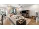 Bright living room with hardwood floors, stylish furnishings, and balcony access at 383 Pratt Se Dr # 504, Atlanta, GA 30315