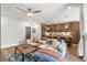 Cozy living room featuring a modern ceiling fan, comfortable sofa, and stylish wood coffee table at 383 Pratt Se Dr # 504, Atlanta, GA 30315