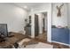 Office space with dark wood desk and blue cabinet at 383 Pratt Se Dr # 504, Atlanta, GA 30315