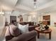 Relaxing basement living area with comfortable seating, pool table, and wet bar at 4223 Millside Se Walk, Smyrna, GA 30080
