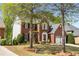 Beautiful brick home with manicured lawn and black shutters at 4223 Millside Se Walk, Smyrna, GA 30080