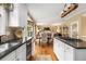An open-concept kitchen with stainless steel appliances and easy flow to the living areas at 4223 Millside Se Walk, Smyrna, GA 30080