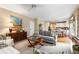 Spacious living area with hardwood floors and views of the kitchen and dining areas at 4223 Millside Se Walk, Smyrna, GA 30080