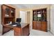 Home office features a large desk, storage cabinets and plenty of room to work at 4223 Millside Se Walk, Smyrna, GA 30080