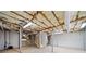 Exposed basement ceiling and utility pipes, unfinished space at 5017 Spring Hill Dr, Sugar Hill, GA 30518