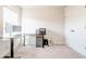 Bright room with a modern desk, dual monitors, and ample closet space for an efficient workspace at 7154 Sw Chara Sw Ln, Atlanta, GA 30331