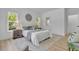 Bright bedroom offers generous natural light and a calming color palette at 1353 Midlawn Dr, Decatur, GA 30032