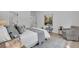 Relaxing bedroom with neutral tones, stylish decor, and bright natural light at 1353 Midlawn Dr, Decatur, GA 30032
