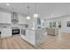 Gourmet kitchen with stainless steel appliances, a marble island, and white cabinets at 1353 Midlawn Dr, Decatur, GA 30032
