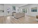 Bright living room features hardwood floors, fireplace, and a door to the backyard at 1353 Midlawn Dr, Decatur, GA 30032