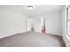 This bedroom has gray walls, carpet flooring, and a window at 3719 Bomar Rd, Douglasville, GA 30135
