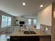 Open-concept kitchen, seamlessly connected to the living room, creating a great flow for entertaining at 4215 Almanor Cir, Norcross, GA 30071