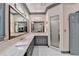 Stylish bathroom features double vanity, marble countertops, and glass shower at 5884 Hammersmith Rd, Stone Mountain, GA 30087