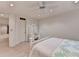 Bright bedroom with light walls, white furniture, and a cozy quilt at 5884 Hammersmith Rd, Stone Mountain, GA 30087
