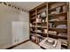 Office features built in bookshelves for storage and reading at 5884 Hammersmith Rd, Stone Mountain, GA 30087