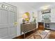 Welcoming entryway with a stylish console table, modern decor, and hardwood flooring at 2336 Armand Ne Rd, Atlanta, GA 30324