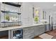 This kitchen features custom cabinets, marble countertops, and premium stainless steel appliances at 2336 Armand Ne Rd, Atlanta, GA 30324