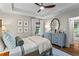 Comfortable primary bedroom with natural light, a ceiling fan, and a cozy atmosphere at 2336 Armand Ne Rd, Atlanta, GA 30324