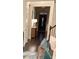 Welcoming foyer with hardwood floors leading to the front door at 3716 Derringer Rdg, Loganville, GA 30052