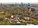 Aerial view of residential community with manicured grounds, mature trees, and easy access to city amenities at 39 Ivy Gates Ne, Atlanta, GA 30342