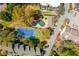Aerial view showcases community amenities: pool, tennis court, lush greenery, and convenient parking at 39 Ivy Gates Ne, Atlanta, GA 30342