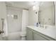 Bright bathroom with shower-tub combo, single vanity, and modern finishes at 39 Ivy Gates Ne, Atlanta, GA 30342