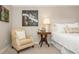 Charming bedroom featuring a cozy chair, classic furnishings, and artwork, creating a serene and inviting retreat at 39 Ivy Gates Ne, Atlanta, GA 30342