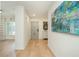 Welcoming entryway features neutral decor and a decorative painting providing a bright and airy feel at 39 Ivy Gates Ne, Atlanta, GA 30342