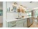 Well-lit kitchen with stainless steel appliances, quartz counters, and stylish decor at 39 Ivy Gates Ne, Atlanta, GA 30342