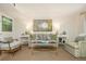 Elegant living room features designer furniture, artwork, and ample natural light at 39 Ivy Gates Ne, Atlanta, GA 30342