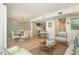 Open-concept living space featuring dining area, kitchen, and comfortable seating at 39 Ivy Gates Ne, Atlanta, GA 30342