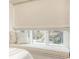 Inviting window seat with plush cushions, offering a cozy spot to relax at 39 Ivy Gates Ne, Atlanta, GA 30342