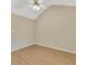 Cozy bedroom featuring wood-look floors and ample natural light at 7112 Brookview Way, Riverdale, GA 30274
