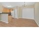 Kitchen and dining area, with a refrigerator, oak cabinets, plenty of counter space and natural light at 7112 Brookview Way, Riverdale, GA 30274