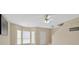 Bright, open living area features large windows, neutral paint, and modern finishes creating an inviting space at 7112 Brookview Way, Riverdale, GA 30274
