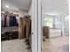 Spacious bathroom connected to walk-in closet with a soaking tub and shower at 719 Fairview Rd, Brooks, GA 30205