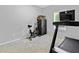 Spare bedroom with carpet and exercise equipment at 719 Fairview Rd, Brooks, GA 30205