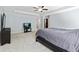 Spacious main bedroom with neutral paint, carpet, and a tray ceiling at 719 Fairview Rd, Brooks, GA 30205