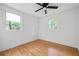 Bedroom featuring hardwood floors and natural light from two windows at 912 Fairburn Nw Rd, Atlanta, GA 30331