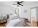Cozy bedroom offers ample natural light and hardwood floors at 912 Fairburn Nw Rd, Atlanta, GA 30331