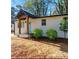 Charming bungalow with white brick and inviting front porch at 912 Fairburn Nw Rd, Atlanta, GA 30331