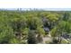 A wide shot shows this home in a green, tree-filled neighborhood with the city skyline in the distance at 195 Childs Nw Dr, Atlanta, GA 30314