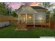 Charming home with a wooden deck and backyard perfect for outdoor relaxation and entertainment at 195 Childs Nw Dr, Atlanta, GA 30314
