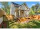 Charming home with a wooden deck and backyard perfect for outdoor relaxation and entertainment at 195 Childs Nw Dr, Atlanta, GA 30314