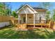 Charming home with a wooden deck and backyard perfect for outdoor relaxation and entertainment at 195 Childs Nw Dr, Atlanta, GA 30314