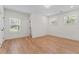Bedroom with 3 doors and wood floors at 195 Childs Nw Dr, Atlanta, GA 30314
