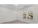 Bedroom with two windows and grey carpet at 195 Childs Nw Dr, Atlanta, GA 30314