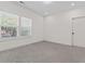 Bright bedroom features two windows, plush carpet, neutral tones, and ample natural light at 195 Childs Nw Dr, Atlanta, GA 30314