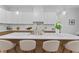Kitchen showcasing a large center island with white marble countertop, and updated cabinetry and finishes at 195 Childs Nw Dr, Atlanta, GA 30314