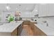Kitchen showcasing state-of-the-art appliances, island with sink, and modern cabinetry and finishes at 195 Childs Nw Dr, Atlanta, GA 30314